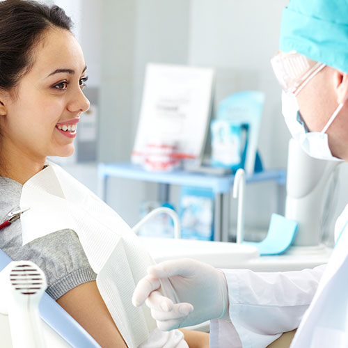 patient talking to dentist